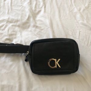 A Calvin Klein fanny belt bag. Gently used